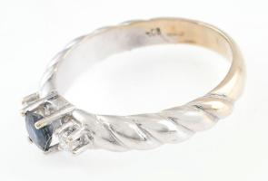 Arany (Au/14k) fehérarany gyűrű zafírral és briliánsokkal ékített, m: 55, bruttó: 3,8g