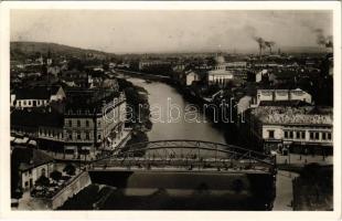 Nagyvárad, Oradea; látkép a Kőrössel, Iván vendéglő és étterem, fodrászat, cukrászat, Friedmann Dezső üzlete, Általános biztosító társaság, Deutsch posztóáruház, zsinagóga, üzletek / Cris riverside, synagogue, restaurant, hairdresser, confetionery, insurance company, shops