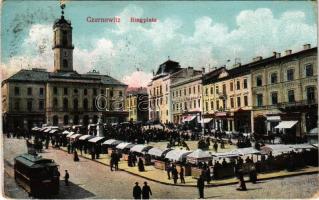 Chernivtsi, Czernowitz, Cernauti, Csernyivci (Bukovina, Bukowina); Ringplatz / square, market, tram, shops (worn corners)
