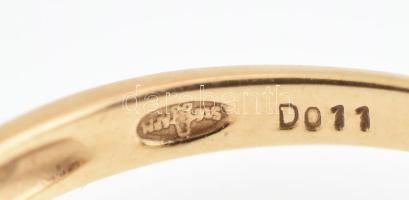 Arany (Au/14k) gyűrű brillel, jelzett, bruttó: 1,8 g, m: 57. Műanyag dobozban