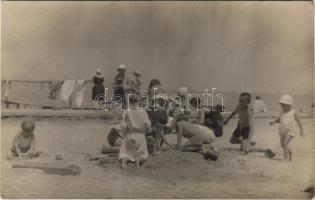 Zamárdi, Balatonzamárdi; homokozó gyerekek a strandon. photo