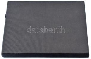 Érmetartó kazetta összesen 12, 50x50mm-es férőhellyel. Használt állapotban