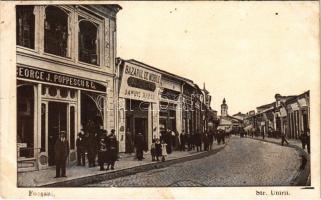 Focsani, Foksány; Str. Unirii / street view, shop of George J. Poppescu & Co. (fl)