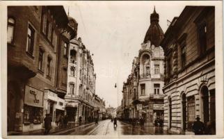 Nagyvárad, Oradea; Rákóczi út, Popper üzlete, illatszertár, dohányáruda / strete view, shops (fa)