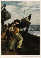 Auf einem deutschen Minensuchboot. PK-Aufn. Kriegsber. Schlemmer, Carl Werner / WWII German Navy minesweeper ships board with mariners
