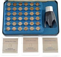 Amerikai Egyesült Államok ~1970. Az USA elnökei 39 darabos Ag emlékérem sorozat eredeti The Franklin Mint díszdobozban, nagyítóval, újságkivágással. 3 darab külön fóliázva, a 24-es sorszám hiányzik, mivel Grover Cleveland ekkor másodjára nyert (~1,2g/0,999/10mm) T:1--2- patina USA ~1970. Presidental Mini-coin set 39 piece AG commemorative coin set in The Franklin Mint case, with magnifying glass (~1,2g/0,999/10mm) C:AU-VF