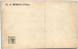 Budapest VIII. Rákóczi út, felvonulás cserkészekkel, Gutmann J. és T. üzlete, villamosok, automobil....