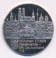 NSZK ~1974. 1974-es labdarúgó-világbajnokság München, Hollandia - NSZK 1:2 kétoldalas jelzett Ag emlékérem (14,85g/0.999/34mm) T:XF patina, karc FRG ~1974. 1974 FIFA World Cup Munich, Netherlands - FRG 1:2 two-sided, hallmarked Ag commemorative medallion (14,85g/0.999/34mm) C:XF patina, scratch