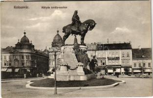 Kolozsvár, Cluj; Mátyás király szobor, Haraszthy Jenő és Farkas üzlete, Erdélyi bank, drogéria. Gombos Ferenc kiadása / statue, shops, bank, drugstore, drogueria