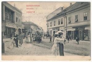 Szászváros, Broos, Orastie; Fő utca, gyógyszertár, Lobstein Lázár és H. Graef üzlete. H. Graef saját kiadása, montázs / main street, pharmacy, shops. montage (ázott sarkak / wet corners)