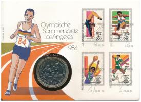 Man-sziget 1984. 1C Cu-Ni XXIII. Olimpia Los Angeles bélyeges borítékban, bélyeggel és bélyegzéssel T:UNC,AU Isle of Man 1984. 1 Crown Cu-Ni Twenty-third Olympiad Los Angeles in coin envelope with stamps and cancellations C:UNC,AU  Krause KM#118