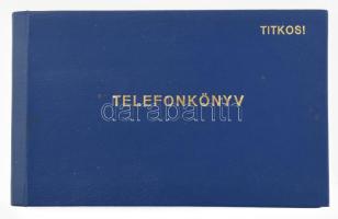 1994 Titkos telefonkönyv, ideiglenes munkapéldány (belügyminisztérium vezetői, szervei, hivatalok). Összeáll.: ORFK Gazdasági és Informatikai Főigazgatóság Híradástechnikai Szolgálat. (8)+138 p. Eredeti műbőr-kötésben, sérült fűzéssel, a könyvtest nagy része kijár.