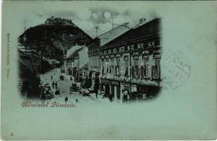 1899 (Vorläufer) Déva, utca, vár a háttérben, Lengyel Dániel, Pap, Schuleri Fritz üzlete este. Hirsch Adolf kiadása / street, shops, castle, night (EK)