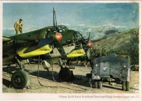 Német Ju 88 harci és zuhanó harcirepülőgép üzemanyagot vesz fel. Ottahall haditudósító felvétele. Carl Werner / WWII German military aircraft (r)