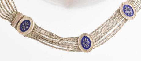 Ezüst (Ag) többsörös nyaklánc, zománcozott ovális díszekkel. Jelzett, kisebb kopásnyomokkal, bruttó:...