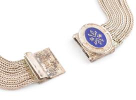 Ezüst (Ag) többsörös nyaklánc, zománcozott ovális díszekkel. Jelzett, kisebb kopásnyomokkal, bruttó:...