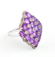 Ezüst(Ag) gyűrű lila kövekkel gazdagon kirakva, jelzett, méret: 56, bruttó: 8,8 g