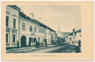 Beszterce, Bistritz, Bistrita; Magyar utca, Albert Binder üzlete. Theodor Botschar kiadása / Ungargasse / street, shops