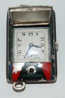 Jelzés nélküli utazóóra néhol lepattogzott zománc tokkal, működőképes állapotban