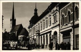 1943 Dés, Dej; Fő utca, templom, Berger Adolf könyv és papírkereskedő üzlete, Hungária szálloda / main street, church, hotel, shops