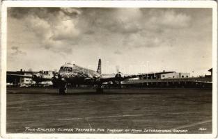 1947 Four-Engined Clipper prepares for takeoff at Miami International Airport, Pan American Clipper flying boat (fa)