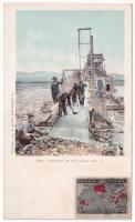 Cleaning up on a gold dredge. Copyright 1903 by Detroit Photographic Co. (EK)