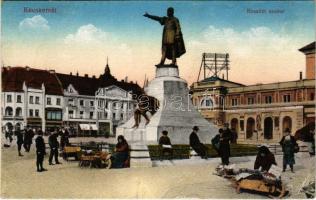 Kecskemét, Kossuth szobor, piac, üzletek. Vasúti levelezőlapárusítás 20. 1916