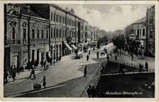 1938 Munkács, Mukacheve, Mukachevo, Mukacevo; Rákoczyho ul. / utca, üzletek / street, shops + 1938 Munkács visszatért So. Stpl (EK)