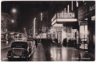 1938 Wroclaw, Breslau; Gartenstrasse / street at night, shops, automobiles