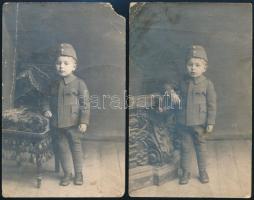 1918.II.24. Bp., kisfiú komplett I. világháborús katonai egyenruhában, 2 db fotó, az egyik a hátoldalon feliratozva, törésnyomokkal, kisebb sarokhiánnyal, 14x9 cm