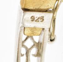 Ezüst (Ag) karkötő szintetikus rubinokkal, jelzett, 5×6 cm, bruttó: 18,6 g