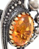 Ezüst(Ag) gyűrű borostyánnal, jelzett, méret: 60, bruttó: 7,5 g