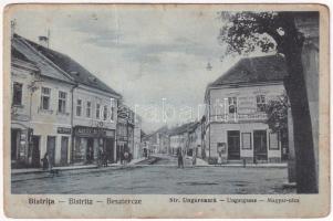 Beszterce, Bistritz, Bistrita; Magyar utca, Központi bank és kereskedelmi részvénytársaság, Gustav Zikeli üzlete / Ungargasse / Str. Ungureasca / street view, bank, publishers shop (fa)