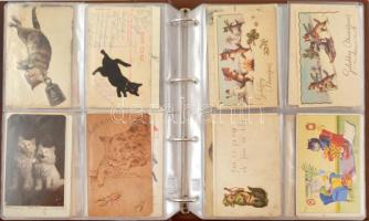 87 db RÉGI motívum képeslap albumban: macskák. Vegyes minőség / 87 pre-1960 motive postcards in an a...
