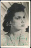 cca 1940 Karády Katalin (1910-1990) autográf aláírása őt ábrázoló fotólapon, hátoldalán ragasztónyomokkal, 14x9 cm