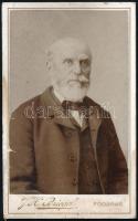 cca 1890-1900 Idős úr portréja, keményhátú fotó J. H. Briegel fogarasi műterméből, vizitkártya, hátoldala sérült, 10,5x6,5 cm