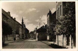 1943 Szigetvár, Rákóczi utca, Palaics V. cipész üzlete, Polgári fiú iskola. Modensieder József kiadása