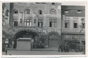 Nagybánya, Baia Mare; István király szálloda, Kárpát filmszínház, mozi, Suba János üzlete, katonák teherautóval / hotel, cinema, shop, soldiers by a military truck. photo