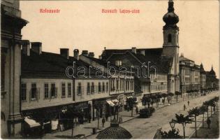 1911 Kolozsvár, Cluj; Kossuth Lajos utca, Juhos József, Kun Mátyás üzlete, templom. Fabritius Erik és Társa kiadása / street view, shops, church (EK)