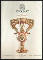 Zsolnay Luxury Porcelain. Angol nyelvű Zsolnay porcelán-katalógus. Színes fotókkal gazdagon illusztrált. Kiadói papírkötés, a borító sarkán gyűrődéssel, 80 p.
