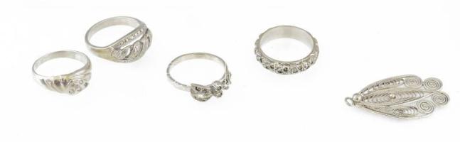 7 db ezüst (Ag) ékszer: gyűrűk (4 db), láncok (2 db), filigrán medál; össz. 34,2 g