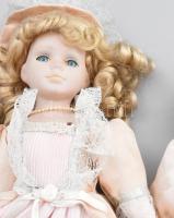 3 db porcelán baba, régi ruhákban, egyik jelzett 16-41 cm