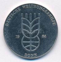 Németország / NSZK 1984. &quot;Deutsche Welthungerhilfe - Bonn&quot; kétoldalas fém emlékérem (32mm) T:2 karc Germany / GFR 1984. &quot;Deutsche Welthungerhilfe - Bonn&quot; two-sided metal commemorative medallion (32mm) C:XF scratch