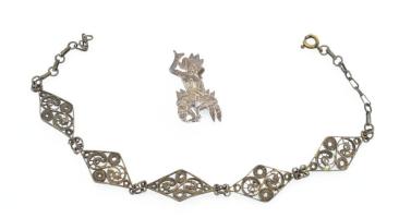 Ezüst(Ag) filigrán karkötő, jelzés nélkül, pótolt kapoccsal + indiai istenség kitűző, jelzés nélkül, bruttó: 7 g