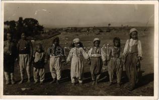 1934 Skopje, Macedonian folklore, barefoot children. photo