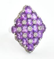 Ezüst(Ag) gyűrű lila kövekkel gazdagon kirakva, jelzett, méret: 56, bruttó: 8,8 g