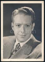 Nelson Eddy (1901-1967) amerikai színész, énekes autográf aláírása őt ábrázoló fotón, alján apró szakadással, 17,5x12,5 cm / Autograph signed photo of Nelson Eddy American actor and singer, with minor tear