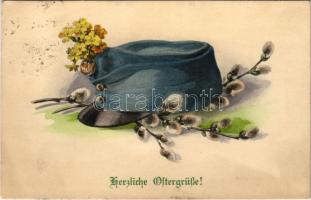 1915 Herzliche Ostergrüsse! / Húsvéti üdvözlet osztrák-magyar katonai sapkával / Easter greeting with K.u.k. military cap. M. Munk Wien Nr. 972 (EK)