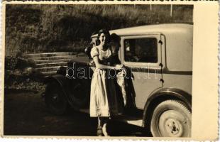 Hölgy autó mellett / Vintage automobile. photo