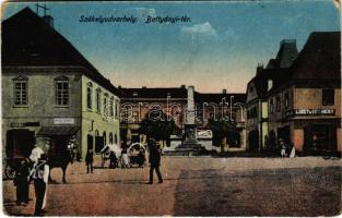 Székelyudvarhely, Odorheiu Secuiesc; Battyányi tér, Liszt és termény üzlet, emlékoszlop / square, shops, monument (kopott sarkak / worn corners)